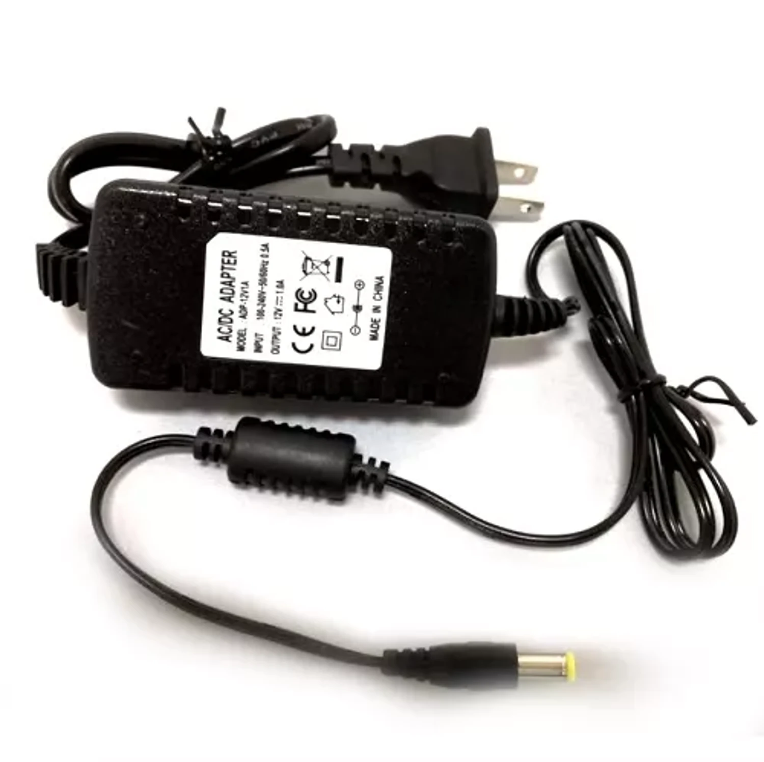 FUENTE ESTABILIZADA / 1 SALIDA 12V. / 1 SALIDA 1 AMP. / CON ENCHUFE